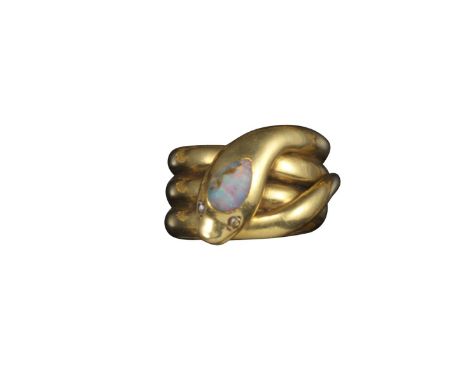 A Victorian opal-set gold snake ring, the stylised serpent set with a cabochon opal to its head and diamond eyes, size K 