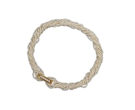 A twisted rope-design seed pearl necklace, with a Victorian gold and blue enamel clasp set with a line of six seed pearls, 34