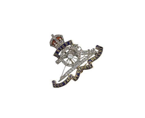 A Regimental brooch for the Royal Regiment of Artillery, set in yellow and white gold with diamond-set gun and enamel decorat