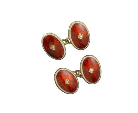 A pair of red and white enamel cufflinks by William James Holmes, each link set with a central circular-cut diamond with red 
