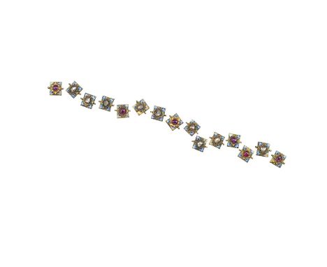 Fifteen Indian gem-set gold plaques, six mounted with a cabochon ruby and nine set with a rose-cut diamond to the rectangular