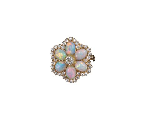 An Edwardian opal and diamond brooch pendant, the hexagonal flower head design set with six cabochon opals centred with an ol