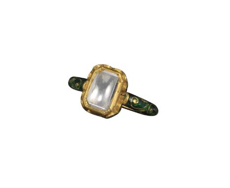 An Indian diamond ring, the rectangular-cut diamond pavé-set in gold with green enamel decoration to the shank, bezel and und