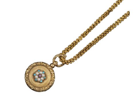 A Regency gold locket pendant, of circular form, set with a flowerhead formed from seed pearls, turquoise and a ruby, within 