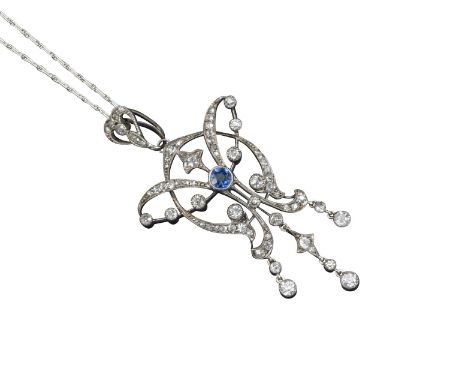 An Art Nouveau diamond and sapphire pendant, millegrain-set with graduated circular-cut diamonds to the scroll design, centre