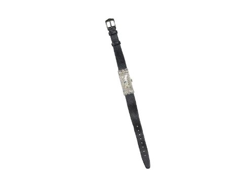A lady's diamond wristwatch by Rolex, the signed rectangular silver dial with black Arabic numerals, the case millegrain-set 