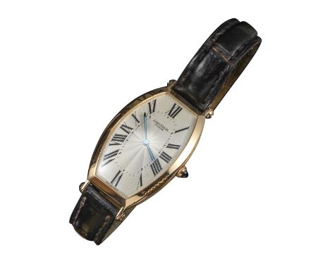 A gentleman's pink gold Tonneau wristwatch by Cartier, the signed guilloche dial with black Roman numerals and secret signatu