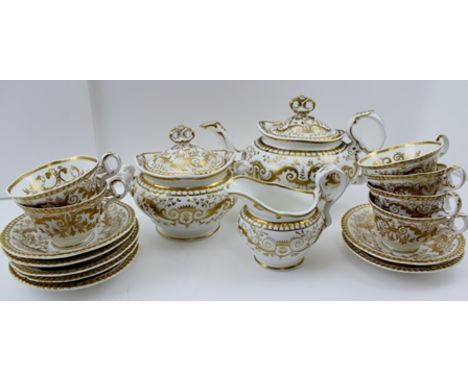 AN EARLY 19TH CENTURY SPODE FELSPAR TEA SERVICE FOR SIX, gilded design, comprising; teapot with cover, lidded sucrier, milk j