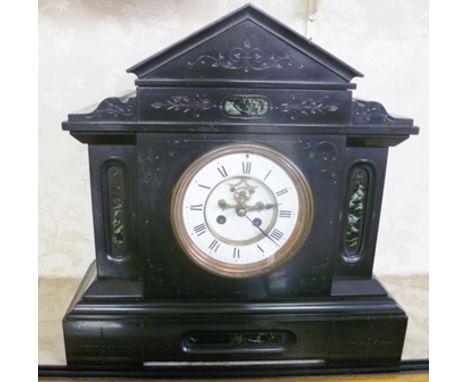A LATE VICTORIAN BLACK SLATE MANTEL CLOCK having white enamel dial with Roman numerals, Brocot outside escapement, 39cm high 