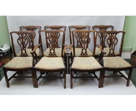 A SET OF EIGHT MAHOGANY CHIPPENDALE DESIGN DINING CHAIRS, each having pierced and carved back splat with floral detail, on sq