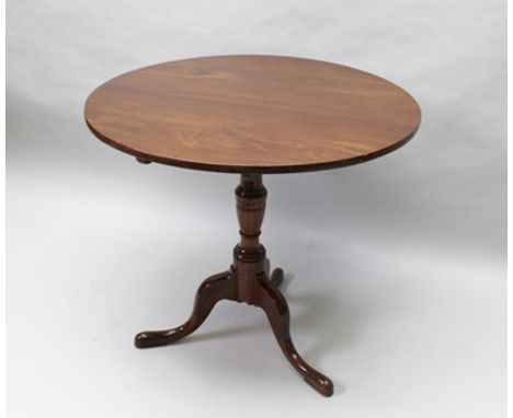 A GEORGE III MAHOGANY SNAP TOP SUPPER TABLE, raised on turned stem and arched tripod supports, 79cm diameter 