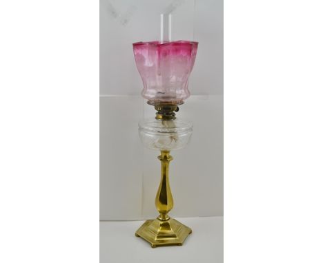 A LATE VICTORIAN "EVERED" OF BIRMINGHAM DUPLEX SYSTEM OIL LAMP, clear cut glass reservoir on a hexagonal brass stem and base,