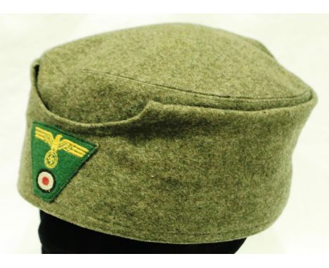 German WWII alpine/mountain troops enlisted mans cap with padded lining, in very good order. P&amp;P Group 2 (£18+VAT for the