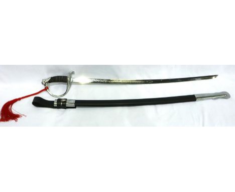 A replica US Marines dress sword with scabbard and leather frog. P&amp;P Group 3 (£25+VAT for the first lot and £5+VAT for su