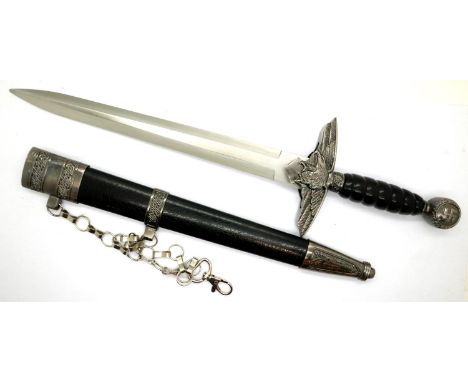 A replica Luftwaffe ceremonial short sword with scabbard and chain hanger. P&amp;P Group 2 (£18+VAT for the first lot and £3+