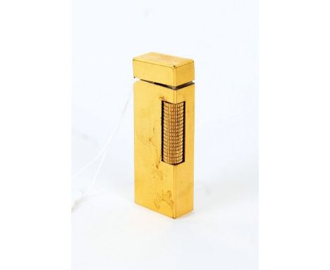Dunhill gold plated lighter, with engine turned case, 6cm tall