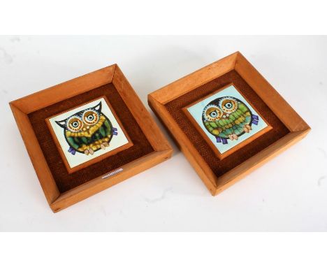 Pair of ceramic tiles, each depicting owls, housed in teak frames, 21.5cm x 21.5cm (2)