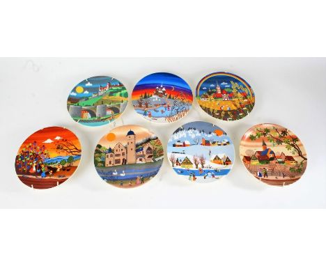 Seven Poole pottery plates, decorated with stylised landscape scenes, to include Autumn I and II, Scene III, V and VIII (7)