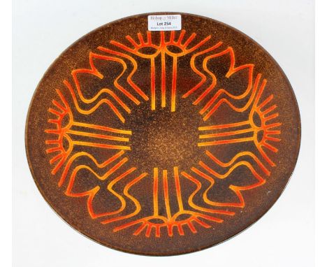 Poole pottery Aegean charger, in brown with abstract motifs in orange, 26.5cm diameter&nbsp;