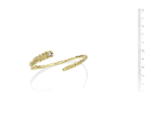 A gold and diamond necklace and bangle, by Grima, 1986The torc necklace designed as a stylised arrow highlighted with brillia