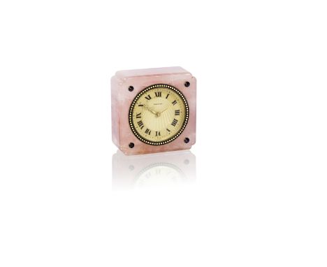 A rose quartz, enamel and sapphire desk clock, by cartier, circa 1920The square rose quartz case with shaped shoulders, appli