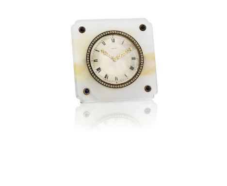 An Art deco agate, enamel and sapphire desk clock by Cartier, circa 1920The square-shaped agate case with shaped corners and 