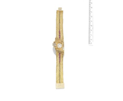 A ruby and diamond watch/bracelet, by Kutchinsky, 1977The cover set with a scroll of brilliant-cut diamonds between polished 