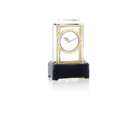An art deco rock crystal, gold, agate, enamel and diamond-set 'Mystery Clock', by Cartier, 1919, Pendule Mysterieuse 'Model A