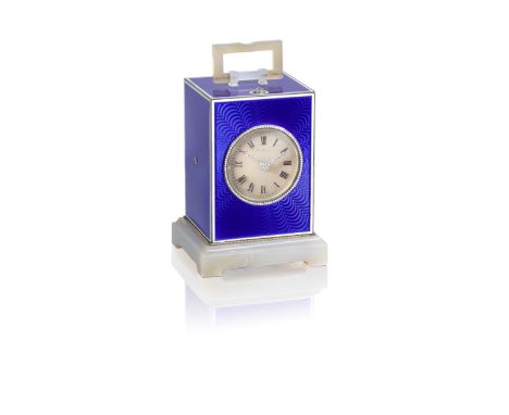 An art deco silver, enamel, onyx and diamond-set quarter repeating and petite sonnerie striking desk clock with electrically 