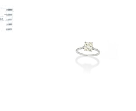 A diamond single-stone ringThe old cushion-shaped diamond between brilliant-cut diamond shoulders, principal diamond approxim