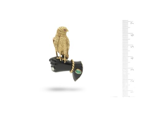 A gold, enamel and gem-set falconry brooch, by Cartier, circa 1935-40Modelled as a gold hawk with textured and engraved feath