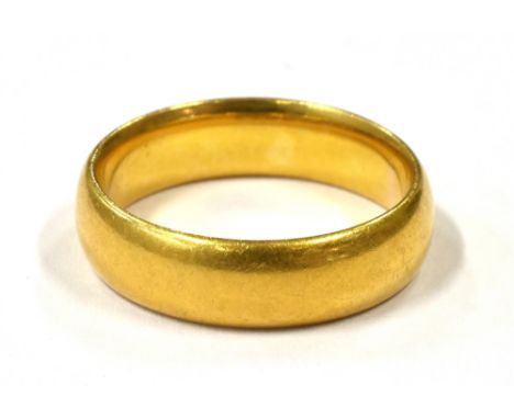 AN 18CT GOLD BAND RING  band width 5mm, ring size J, weight 5.5g, faded hallmark, possibly Sheffield