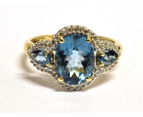 QVC 9CT GOLD SAPPHIRE CLUSTER RING The ring set with a faceted oval sky blue sapphire measuring 9 x 8mm with a small sapphire