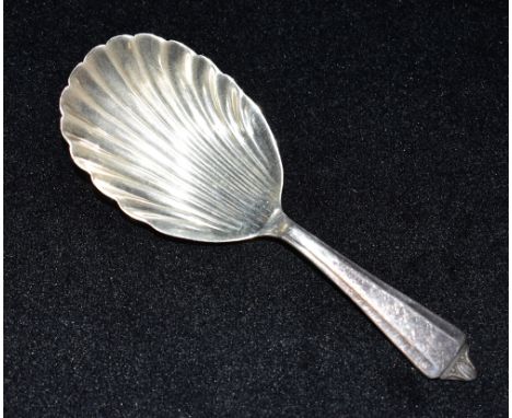 A VINTAGE SILVER TEA CADDY SPOON the spoon with Albany tip and shell bowl, hallmarked for Birmingham 1969, length 9.8cm SOLD 