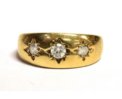 9CT GOLD PASTE SET GYPSY RING The ring set with three star set clear paste stones, worn 375 hallmark to the shank, ring size 