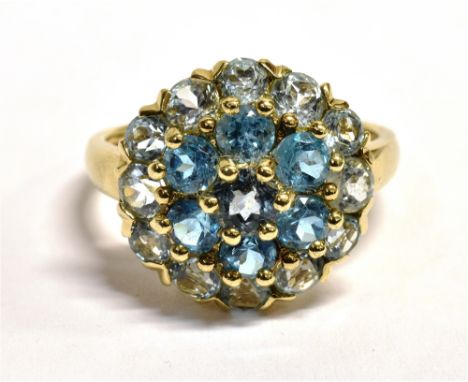 QVC 9CT GOLD GEM CLUSTER RING The ring set with seven round cut sky blue gemstones and 12 pale blue gemstones, ring size Q, w