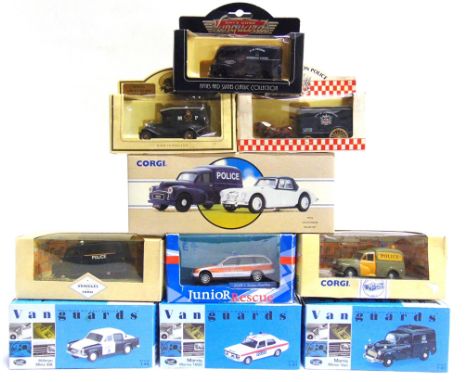 TEN DIECAST MODEL POLICE VEHICLES  many 1/43 scale, by Corgi (3), Vanguards (3) and others, each mint or near mint and boxed.