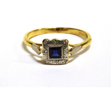 VINTAGE GEM SET PLAQUE RING The square plaque in milgrain white metal with diamond accents and a blue gem square centre on an