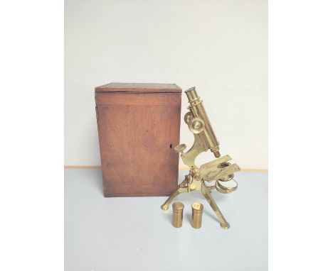 A 19th century monocular microscope by Dollond of London c1880s signed on the foot ''Dollond London'' serial no. 3638. Gilt b