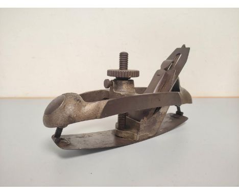 A fine early 20th century Stanley No.20 compass/contour woodworking plane. 