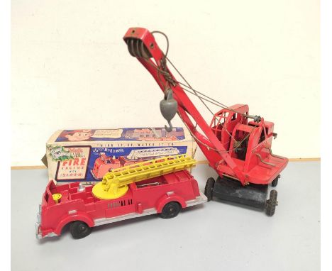 Triang. Vintage tinplate KL 44 model Jones Mobile Crane. Red body, with black base and litho-printed details to underside, al