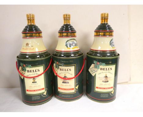 Three bottles of BELLS blended Scotch whisky to include Christmas 1988 and Christmas 1989 and Christmas 1990 each bottled in 