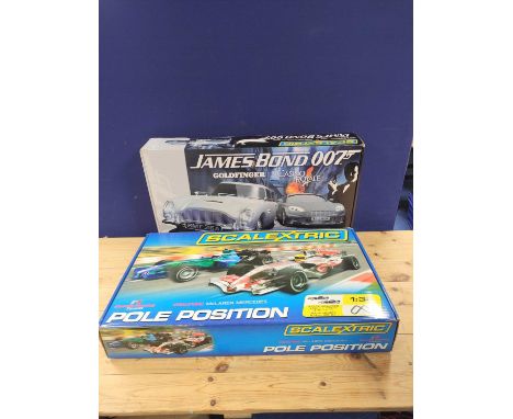 Two boxed Scalextric sets to include a James Bond 007 Goldfinger / Casino Royale set with Aston Martin DB5 Goldfinger car and