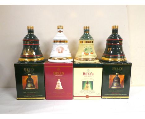 Four bottles of BELLS blended Scotch whisky to include Christmas 1992, 1993, 1998 and 2000, each 40% abv. 70cl in bell shaped