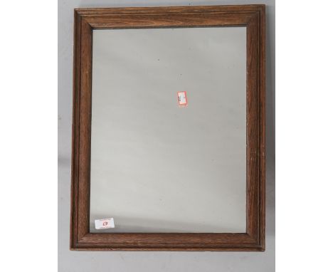 A vintage oak frame wall mirror, approx. 46 x 36cm, in good condtion with little wear to glass