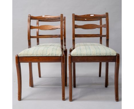 A set of four stained frame reproduction Regency style dining chairs having jade green upholstery