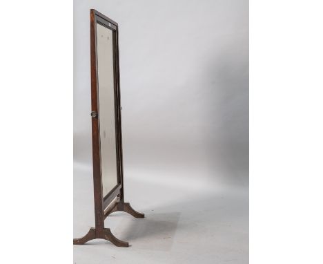An early 20th Century mahogany and stained frame cheval mirror, of plain form, with shaped leg and brass supports, height app