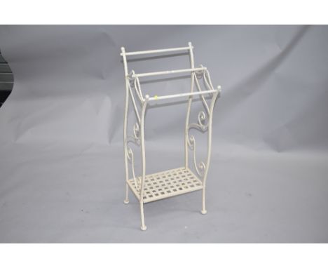 A modern metal and powder coated three rail towel stand, would also possibly work as an umbrella or stick standc, dimensions 