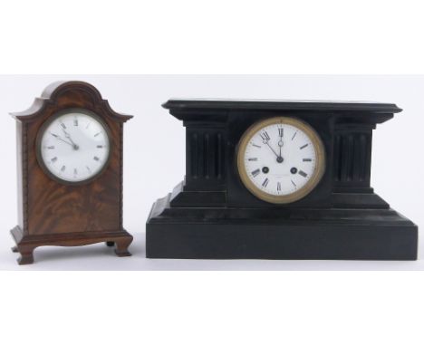 A small Edwardian carved mahogany cased mantel clock,height 23cm and a Victorian slate cased clock, (2).