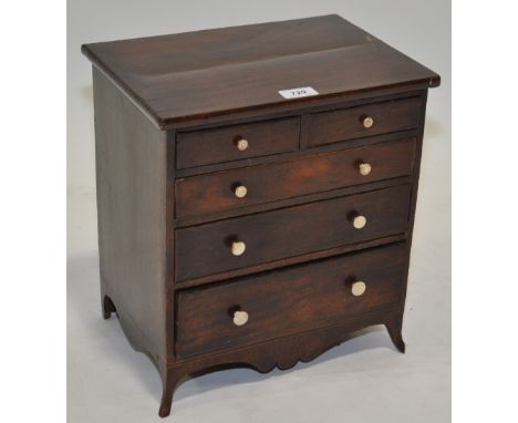 A 19th century mahogany apprentice table top chest,with 2 short and 3 long drawers on bracket feet, width 13", height 14", de